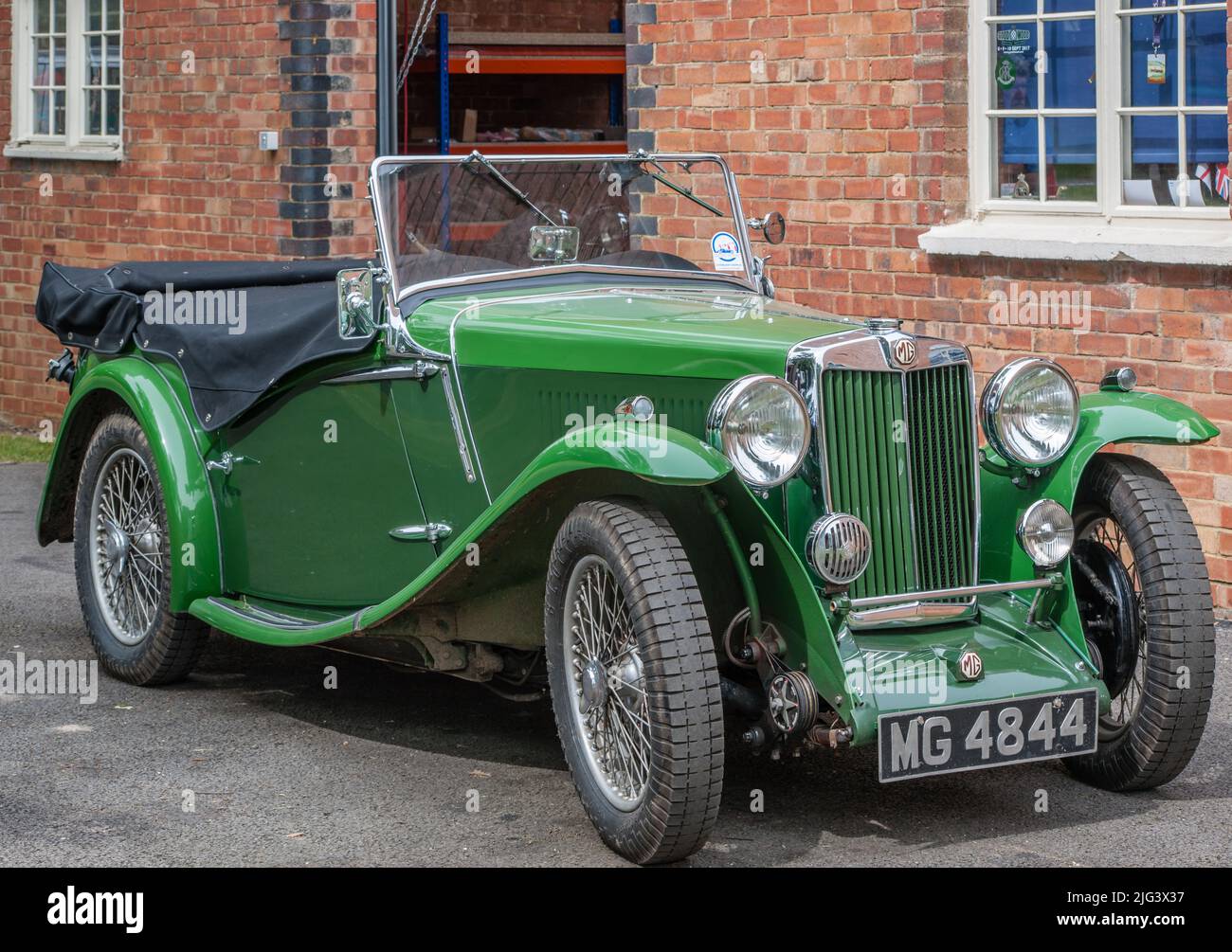 Immaculate British Racing Green MG 'T' Series parked at Bicester Heritage. Stock Photo