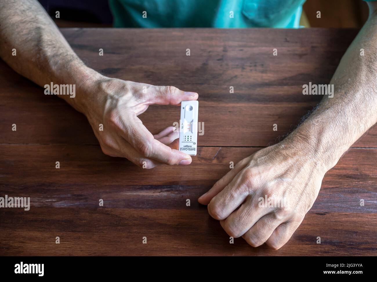 Stressed man home holding green hi-res stock photography and images - Alamy