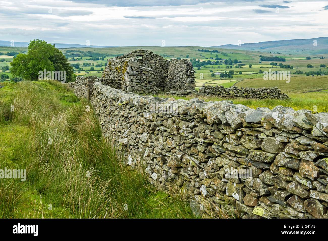 View from Artlegarth in Cumbria over the old barn and landscape photographed early July Stock Photo