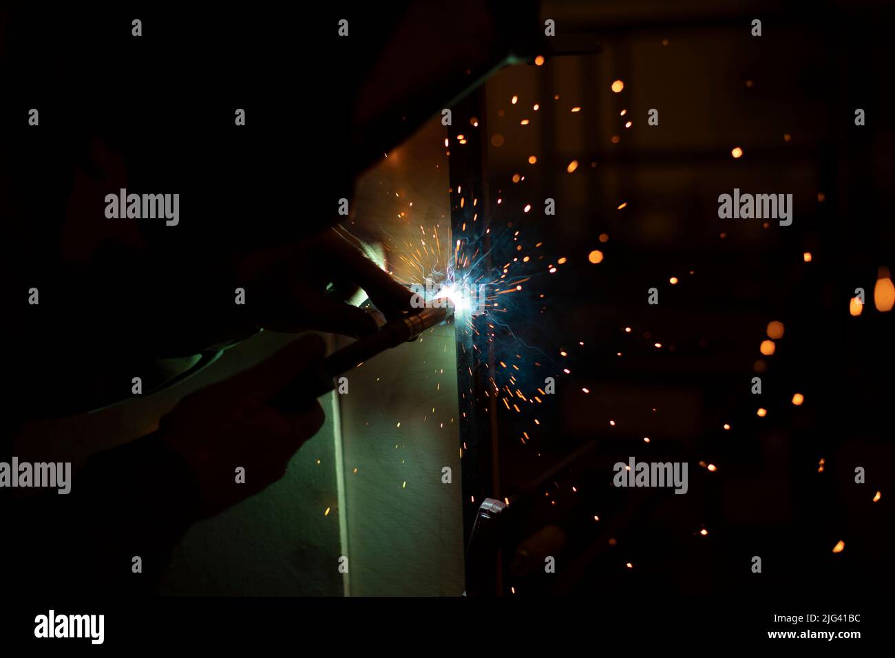 Welding work. High temperature. Hot steel. Metal welding. Production
