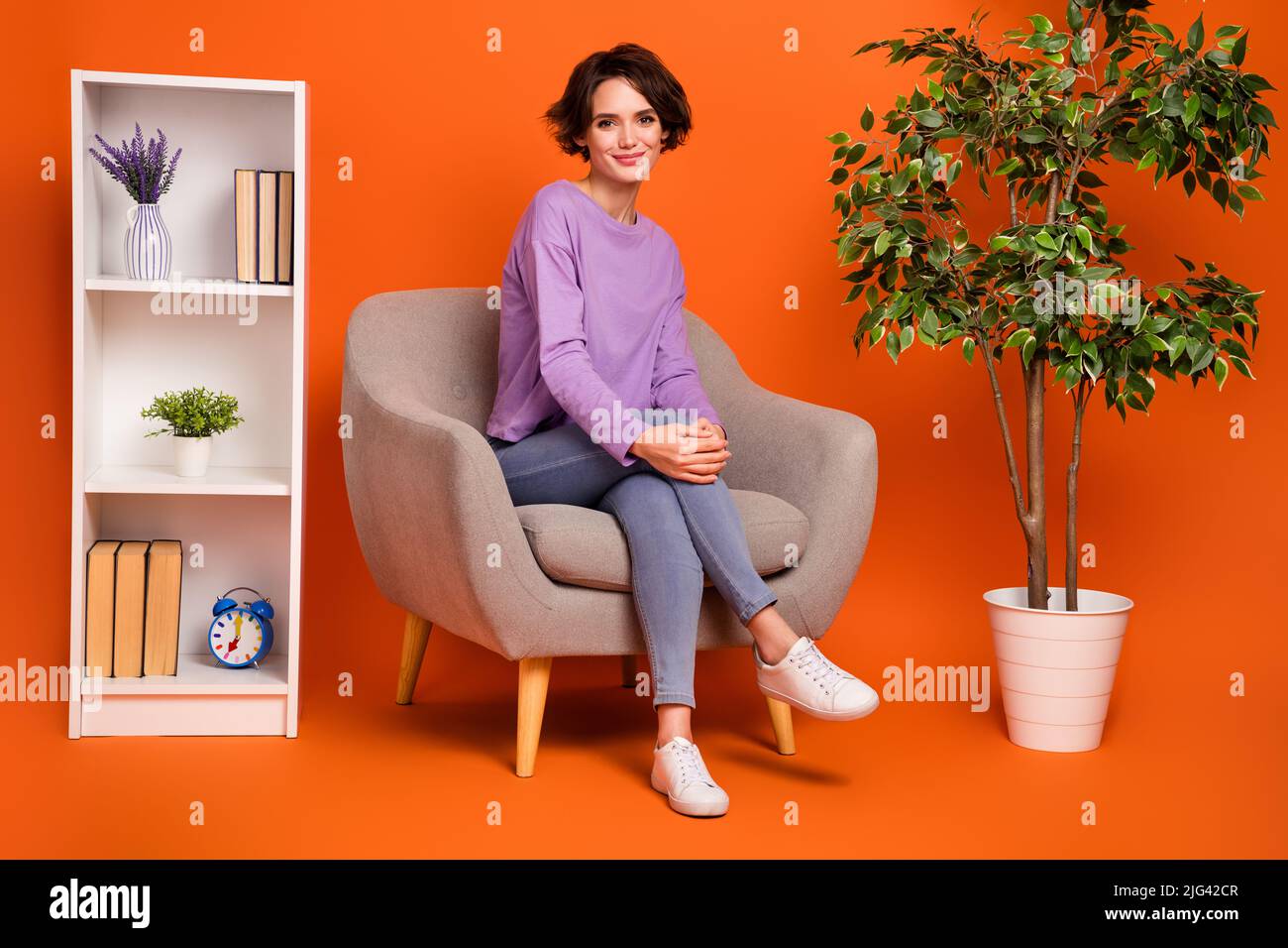 Full length photo of nice satisfied person sitting chair have good mood