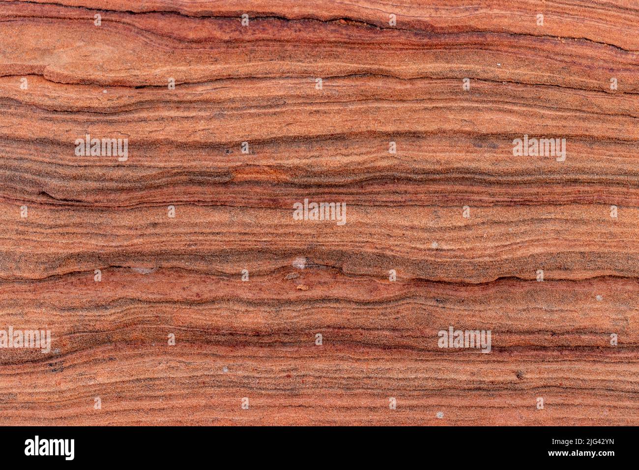 Rock pattern lines go from black to red with every possible color, The Chains, Page, Arizona, USA Stock Photo