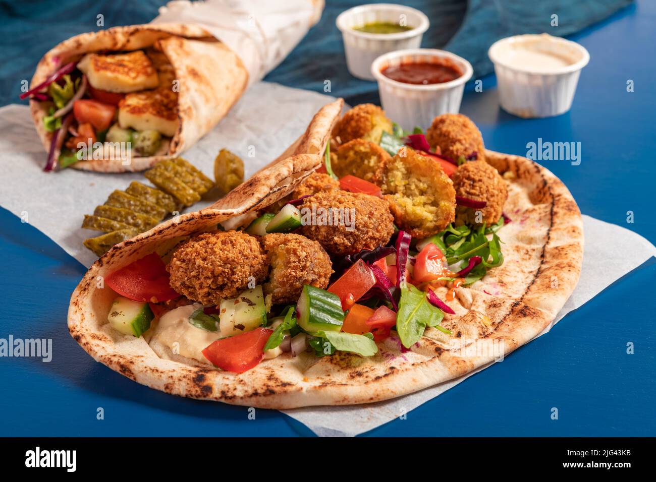 Traditional Mediterranean Arabic grilled halloumi and falafel, hummus