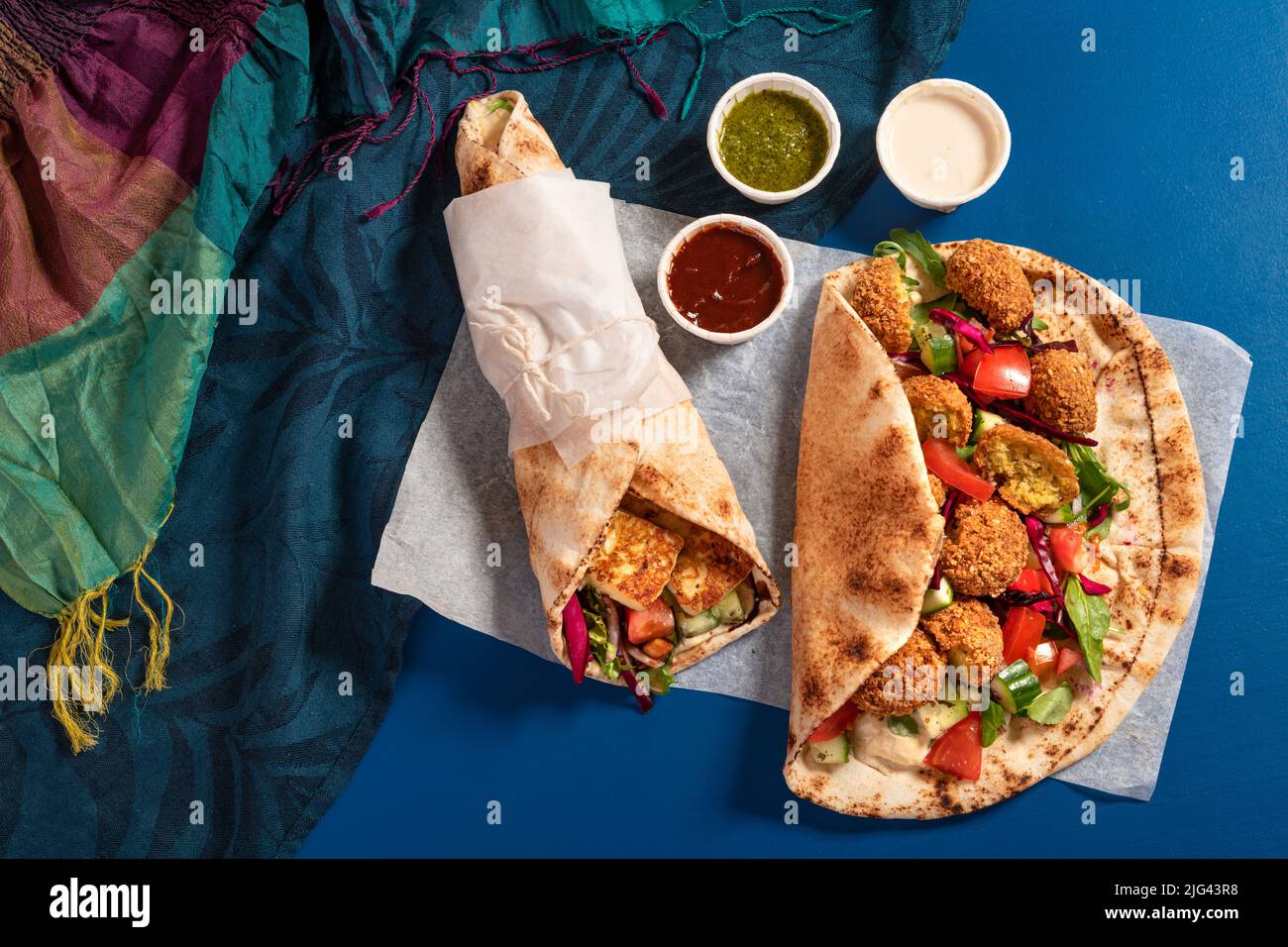 Traditional Mediterranean Arabic grilled halloumi and falafel, hummus