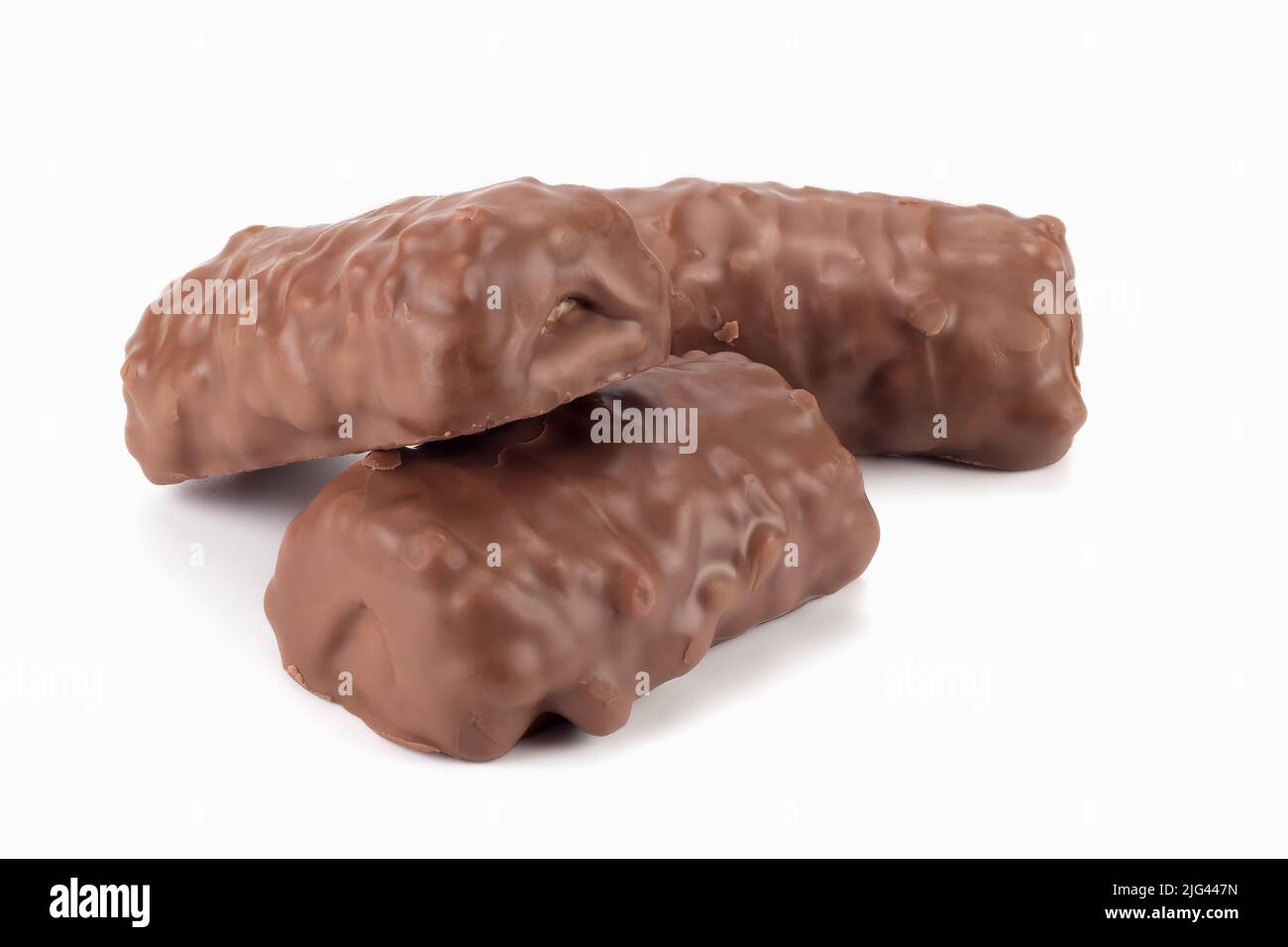 Chocolate bars with peanuts and caramel. Close up view. Stock Photo
