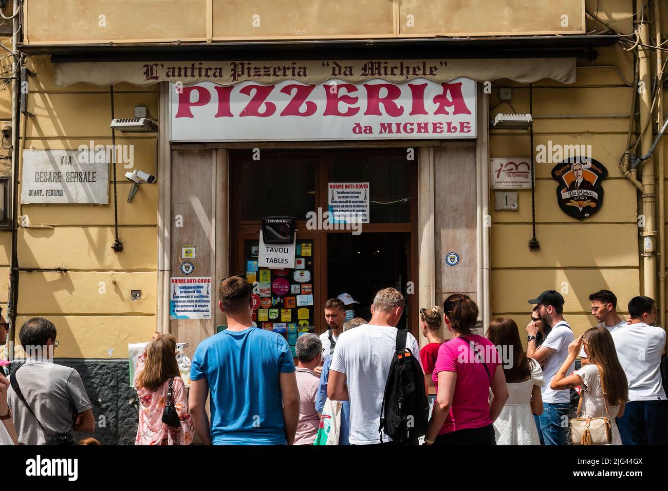 Naples, Italy. May 27, 2022. People waiting outside the famous L'antica Pizzeria da Michele in Naples, Italy. Stock Photo
