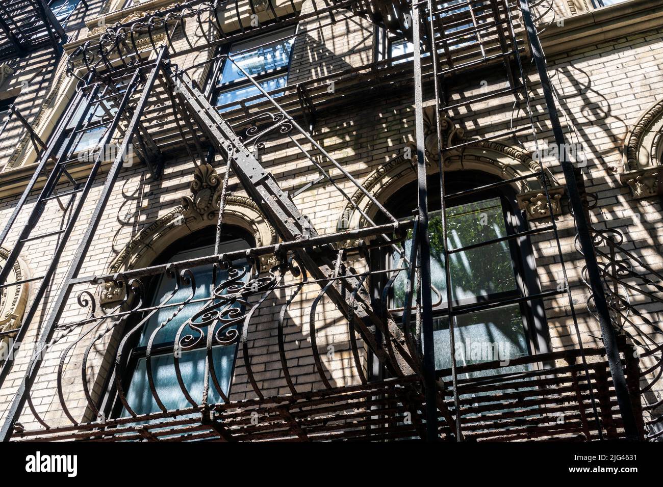 Fire escapes on an occupied multiple dwelling in the Lower East side in New York on Saturday,June 25, 2022. (© Richard B. Levine) Stock Photo