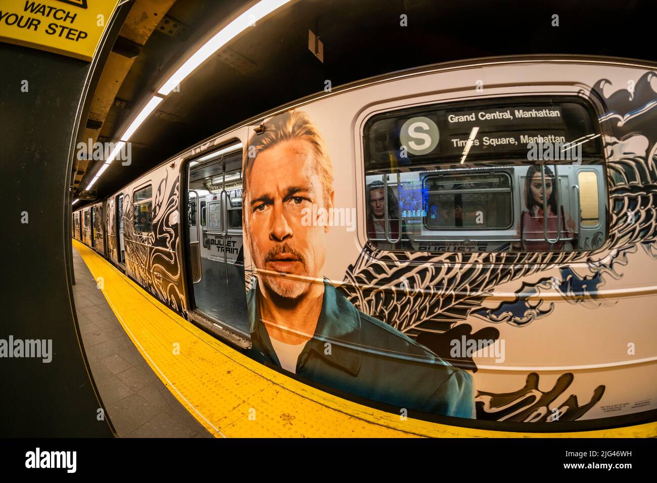 The giant face of Brad Pitt greets commuters in a wrapped 42nd Street shuttle train in Times Square in New York on Saturday, July 2, 2022. The advertising is for the film Bullet Train starring Pitt, and Sandra Bullock among others with a release date of August 5. (© Richard B. Levine) Stock Photo