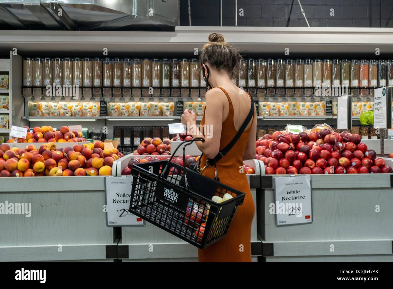 Shopping in a Whole Foods Market supermarket in New York on Tuesday, July 5, 2022. Analysts are predicting next week’s Consumer Price Index figures will reveal whether the Federal Reserve’s efforts have been effective against inflation. (© Richard B. Levine) Stock Photo