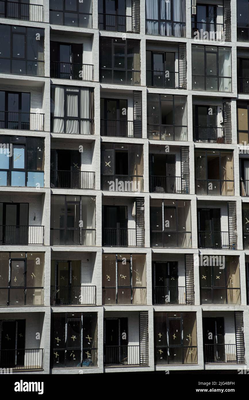 Balconies with panoramic windows of an apartment building close up ...