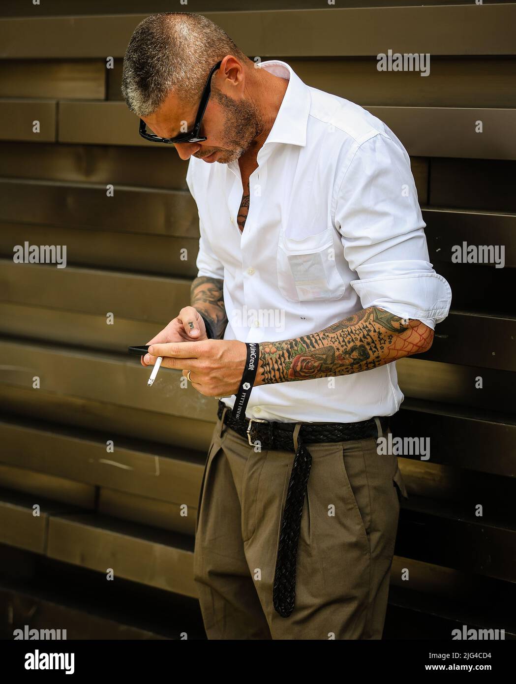 FLORENCE, Italy June 16 2022 Men on the street in Florence Stock