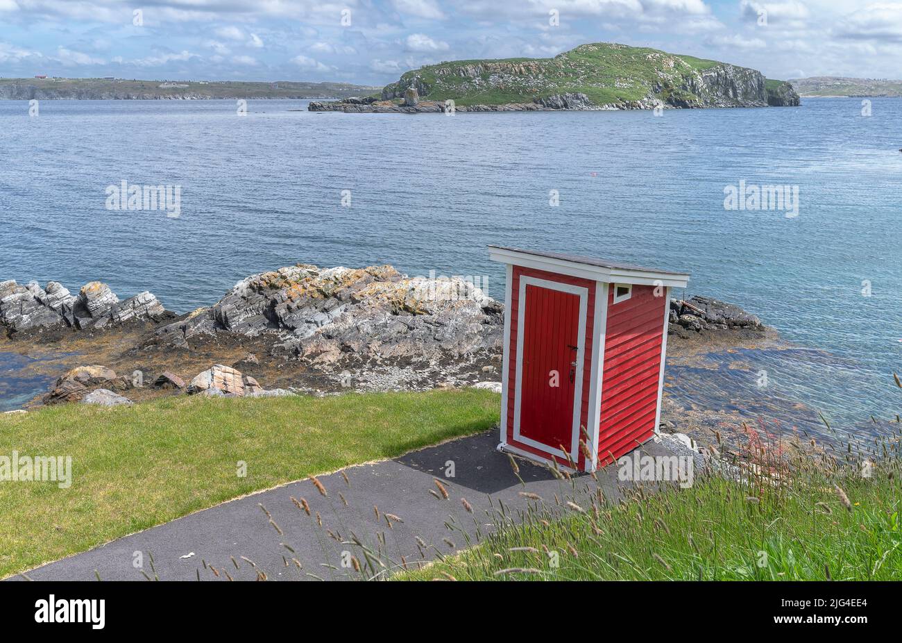 Outhouse at Bay Roberts with Fergus Island in the background Stock Photo