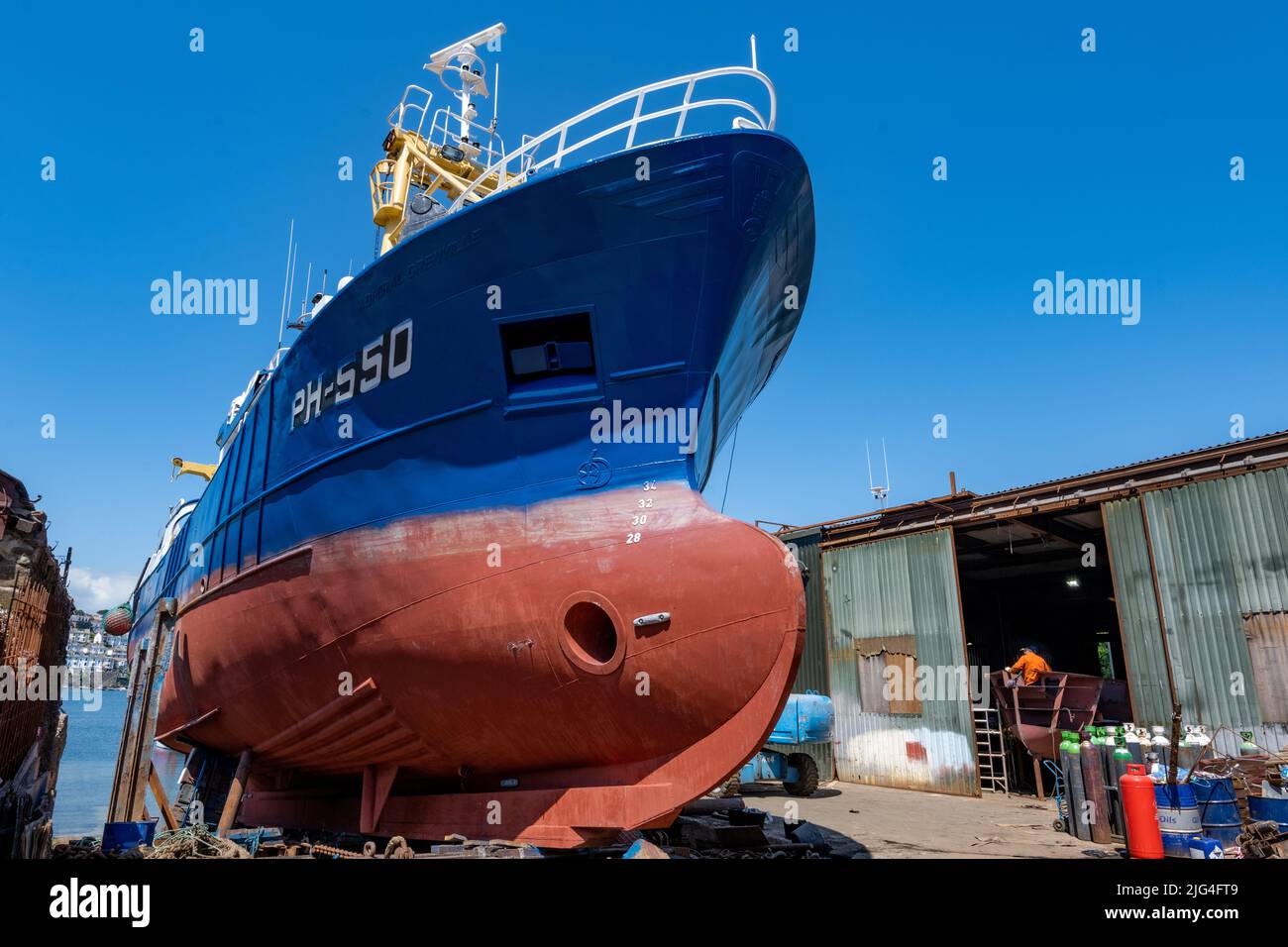 Fishing boat repairs. FV Admiral Grenville on a slipway at Fowey, Cornwall, UK Stock Photo