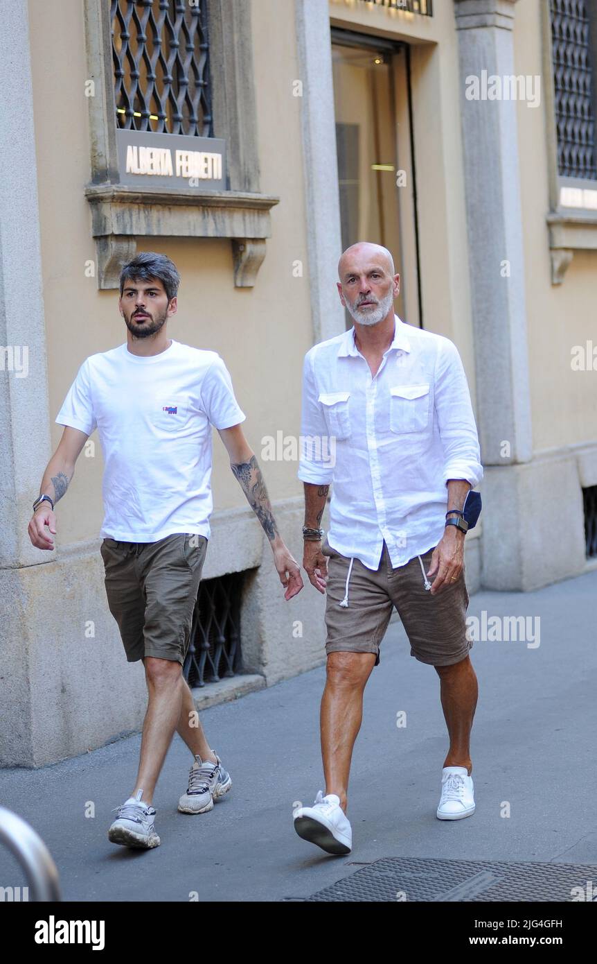 Milan, . 07th July, 2022. Milan, 07-07-2022 Stefano Pioli, coach of the  Italian champion MILAN, walks through the streets of the center with his  27-year-old son GIANMARCO who holds the role of