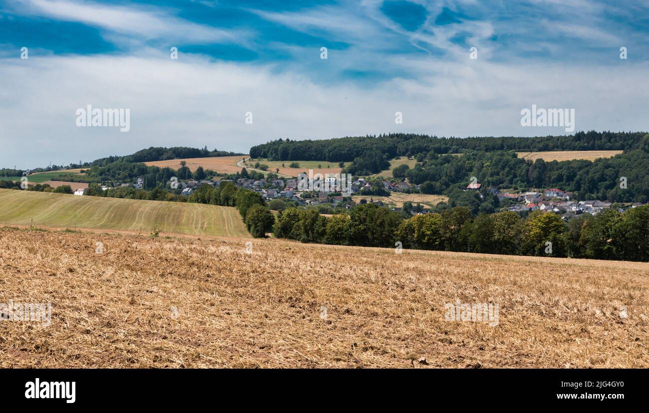 View over the German countryside in Rhineland-Palatinate with plowed agriculture fields , Germanny Stock Photo