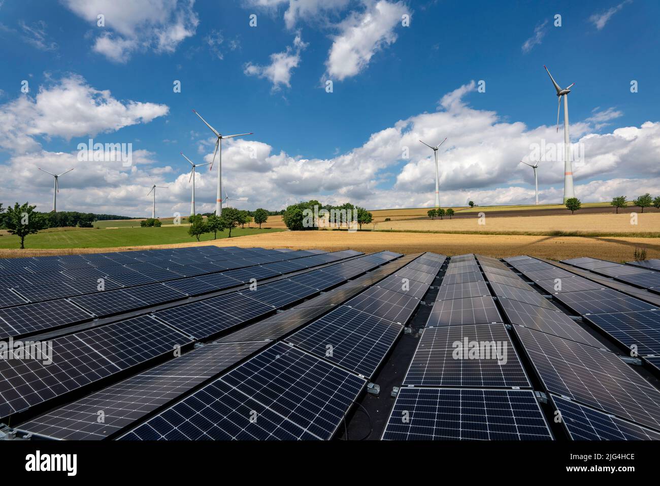 Wind farm near Lichtenau, East Westphalia-Lippe, a 100 kW solar power system was installed on the crane installation area in front of a wind turbine, Stock Photo