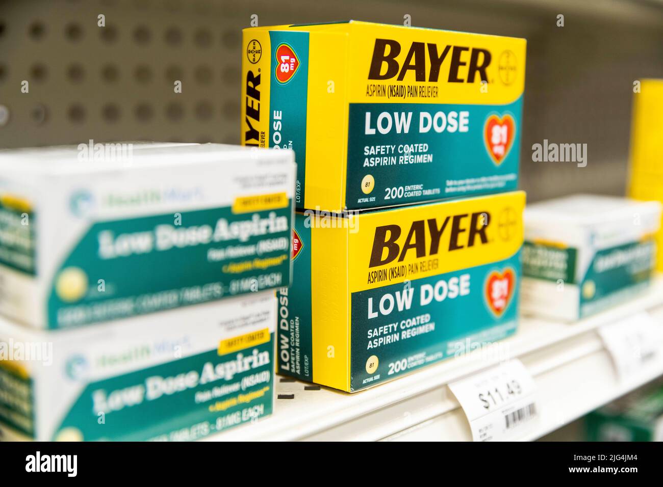 boxes of Bayer brand aspirin sit on a drug store shelf Stock Photo Alamy