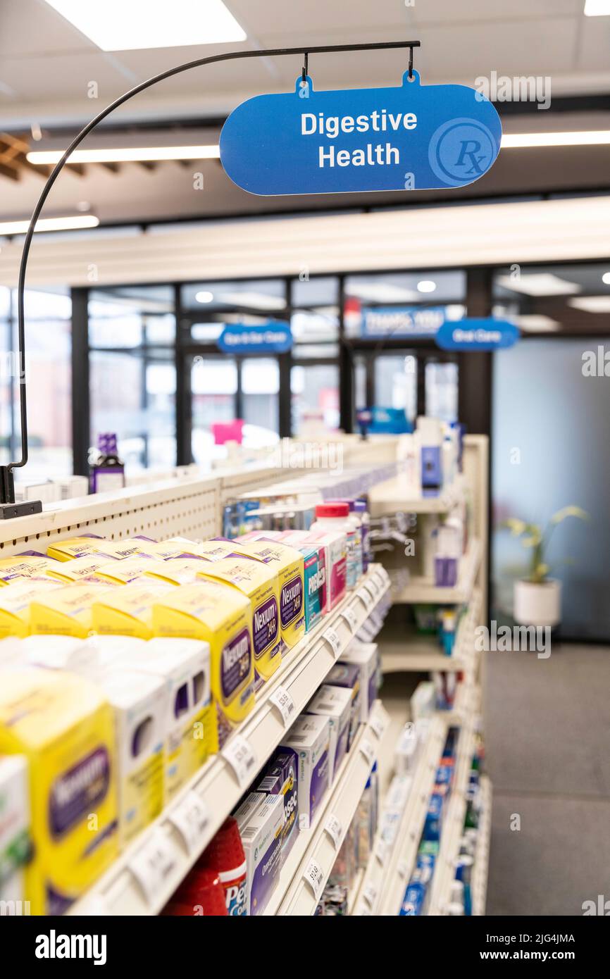A section of an independent drug store labeled with a digestive health sign Stock Photo