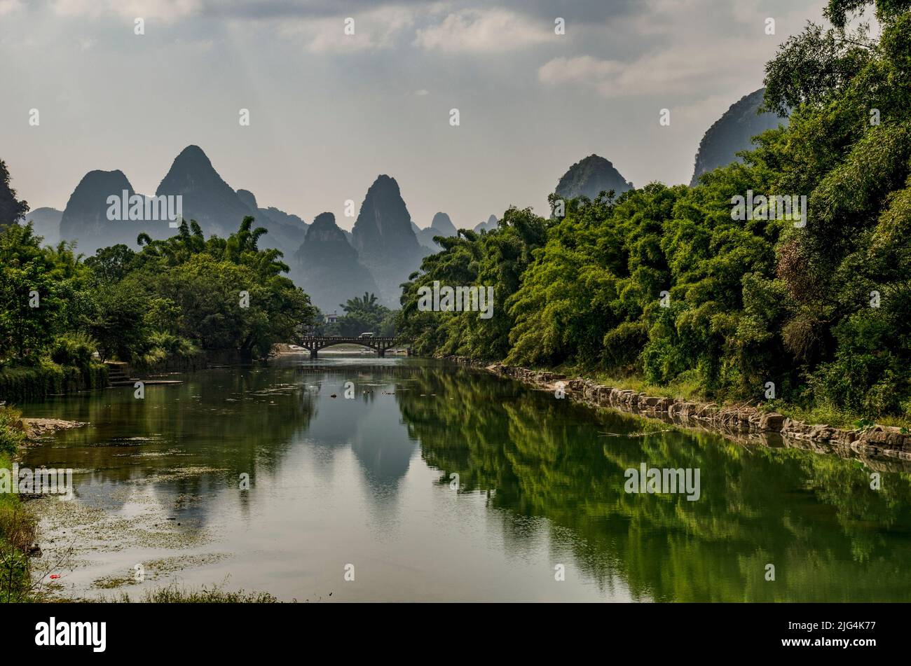 Karstic mountainous landscape in the vicinity of the Li River in Guilin, China. This landscape is typical of the area. Stock Photo