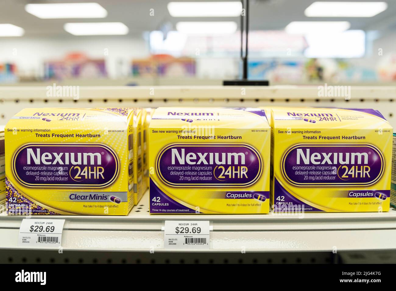 Boxes of Nexium brand heartburn medications sit on the shelf of a drug store Stock Photo