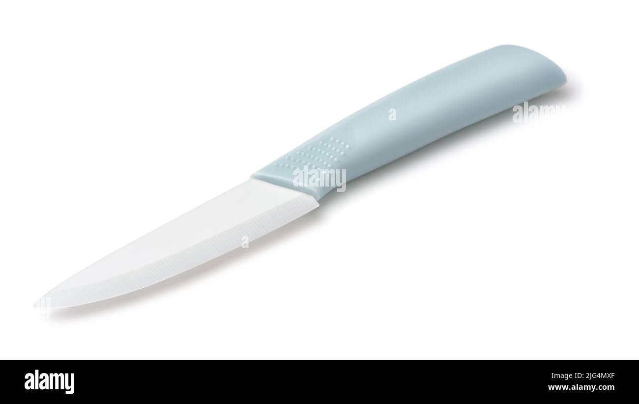 White blade ceramic kitchen knife isolated on white Stock Photo