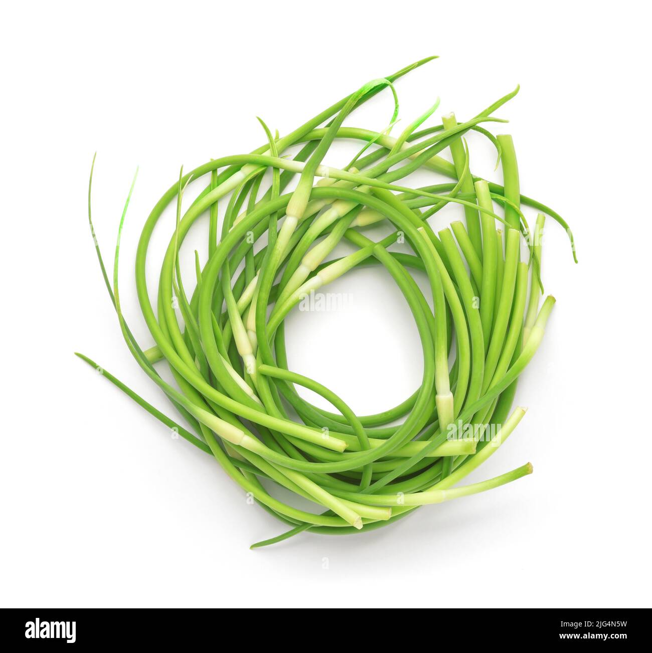 Top view of fresh young garlic scapes isolated on white Stock Photo