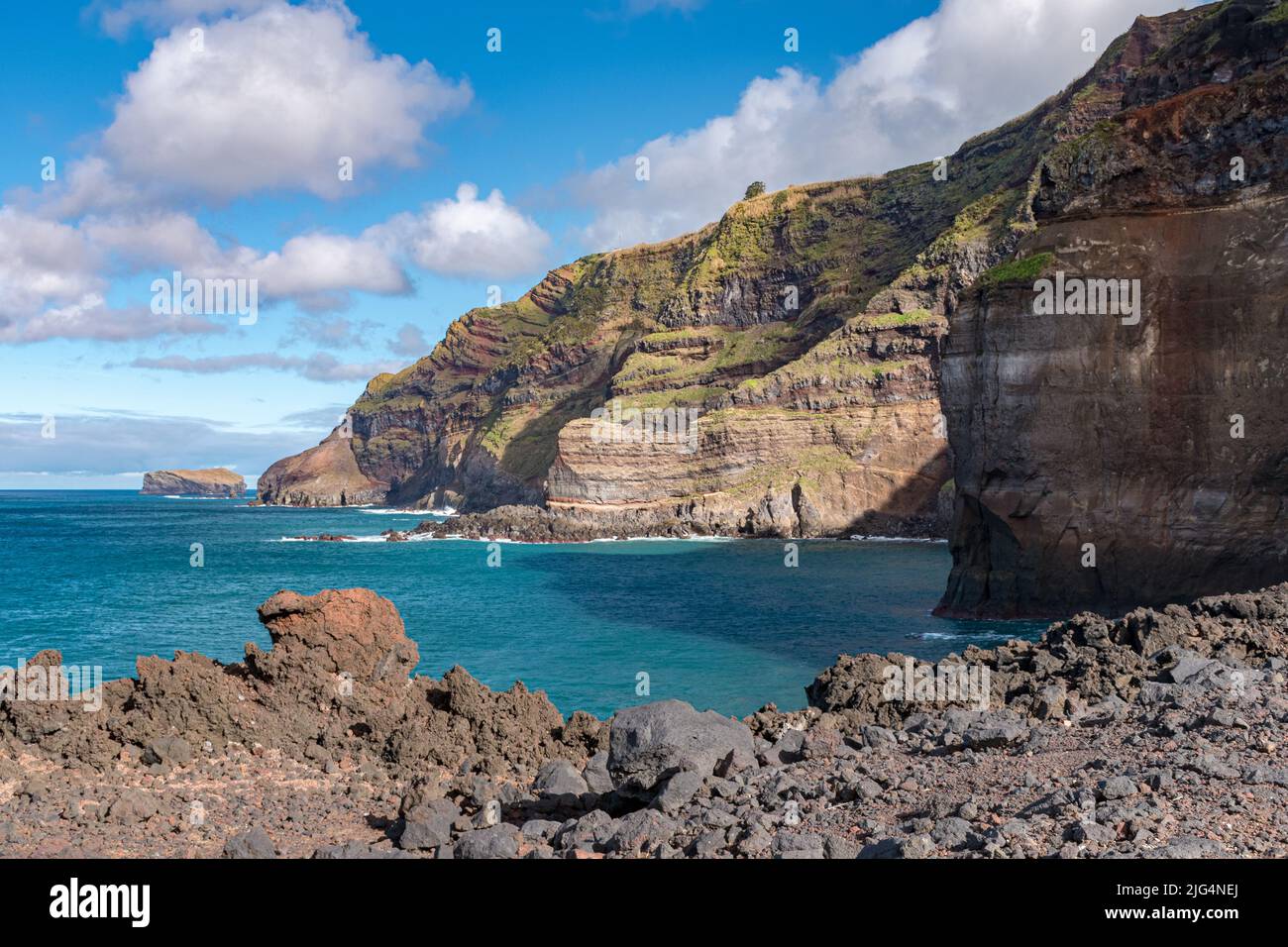 Rocky cliffs in the western part of Sao Miguel island, near Ponta da Ferraria. Azores, Portugal. Stock Photo