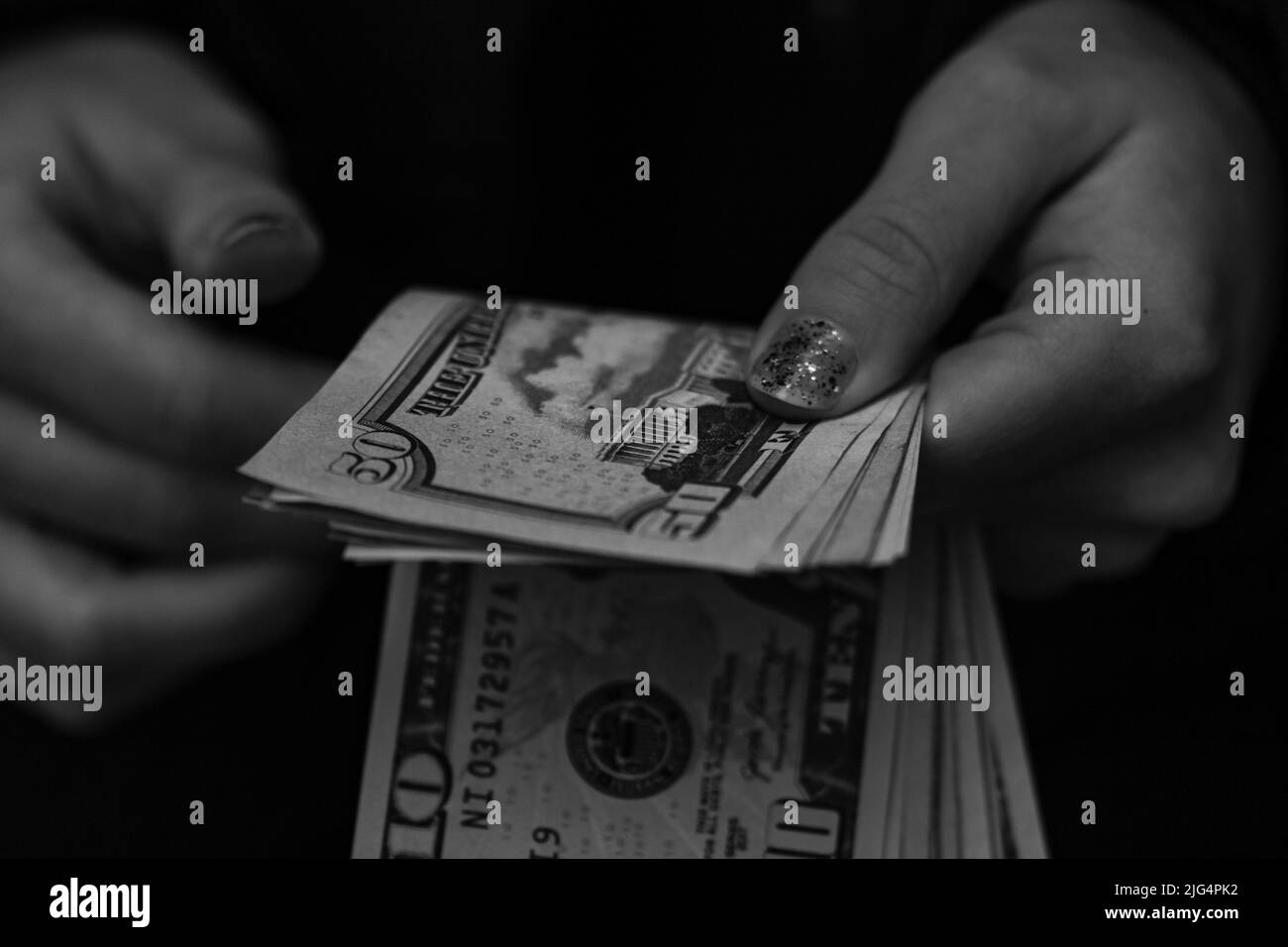 100 dollars banknotes Black and White Stock Photos & Images - Alamy
