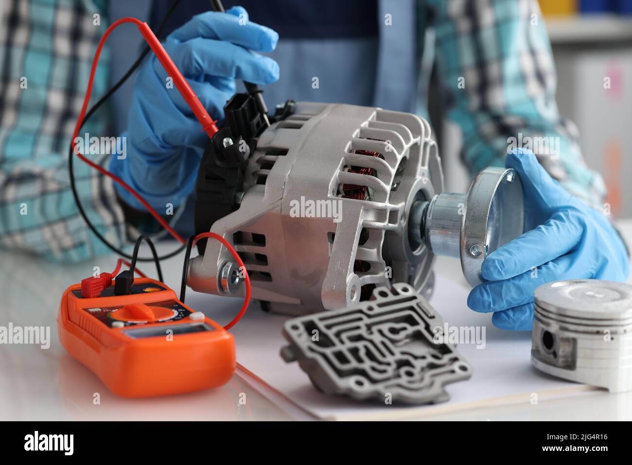 Automotive alternator repair test stator closeup with copper coil in