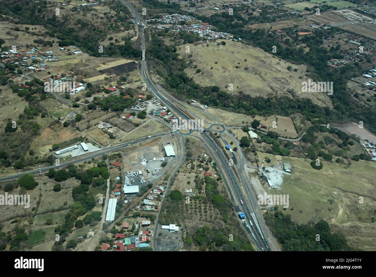 aerial photo of suburban San Jose with dual carriageway San Jose, Costa Rica,               March Stock Photo
