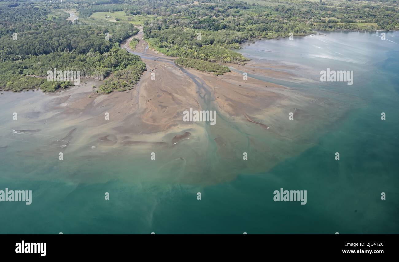 Aerial view of river mouthshowing delta with sediment build up Pacific