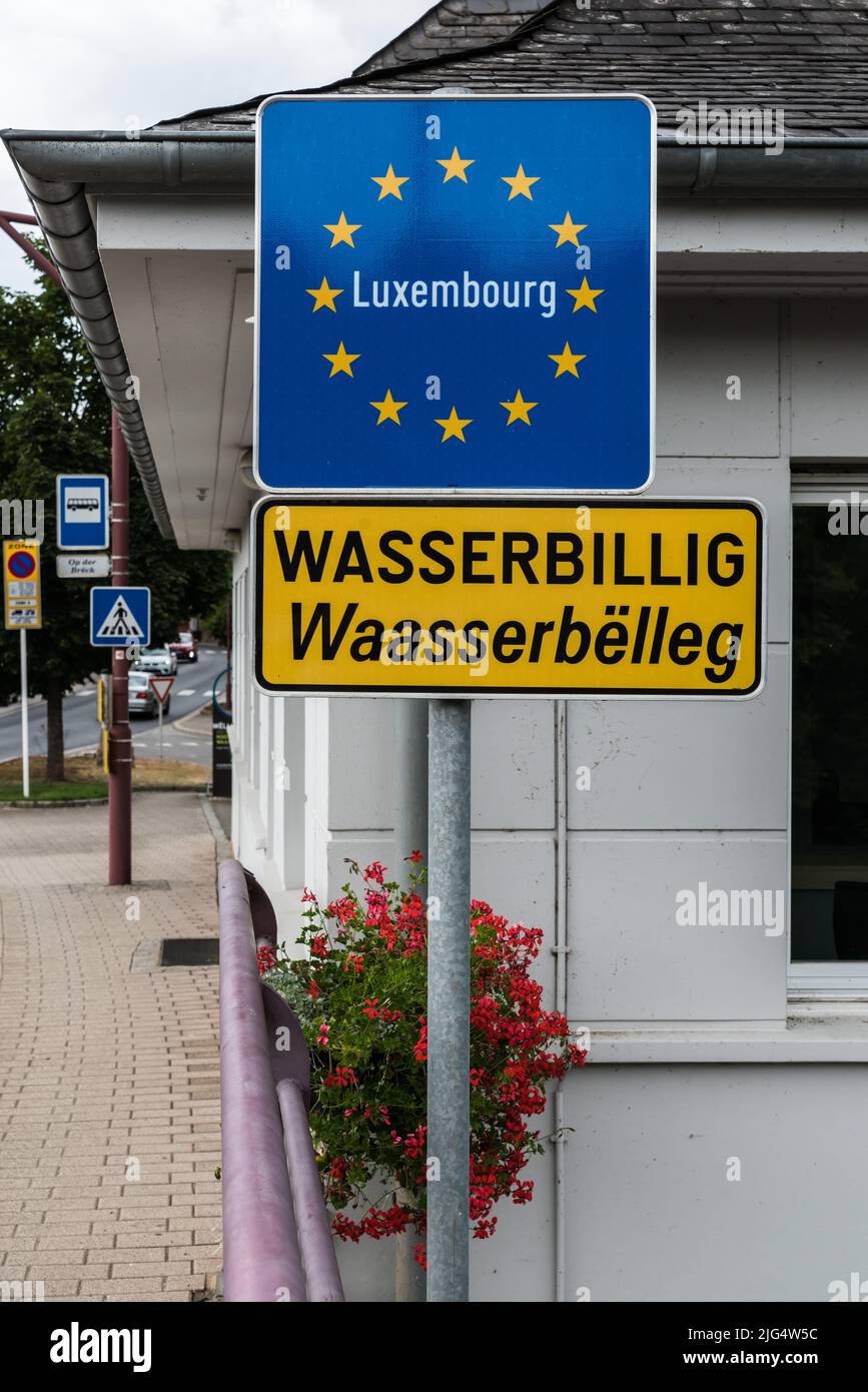 Wasserbillig, Mertert  Grand Duchy of Luxembourg - 08 08 2020 Sign at the entrance of Wasserbillig at the German Luxembourg border Stock Photo