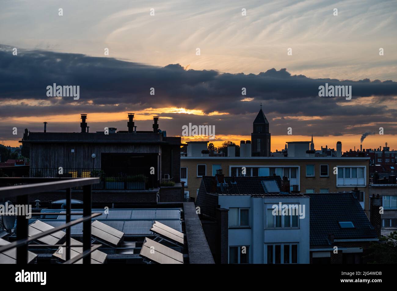 Jette, Brussels Capital Region, Belgium- 07 06 2022 - Cityscape view during an early morning  sunrise in a residential area Stock Photo