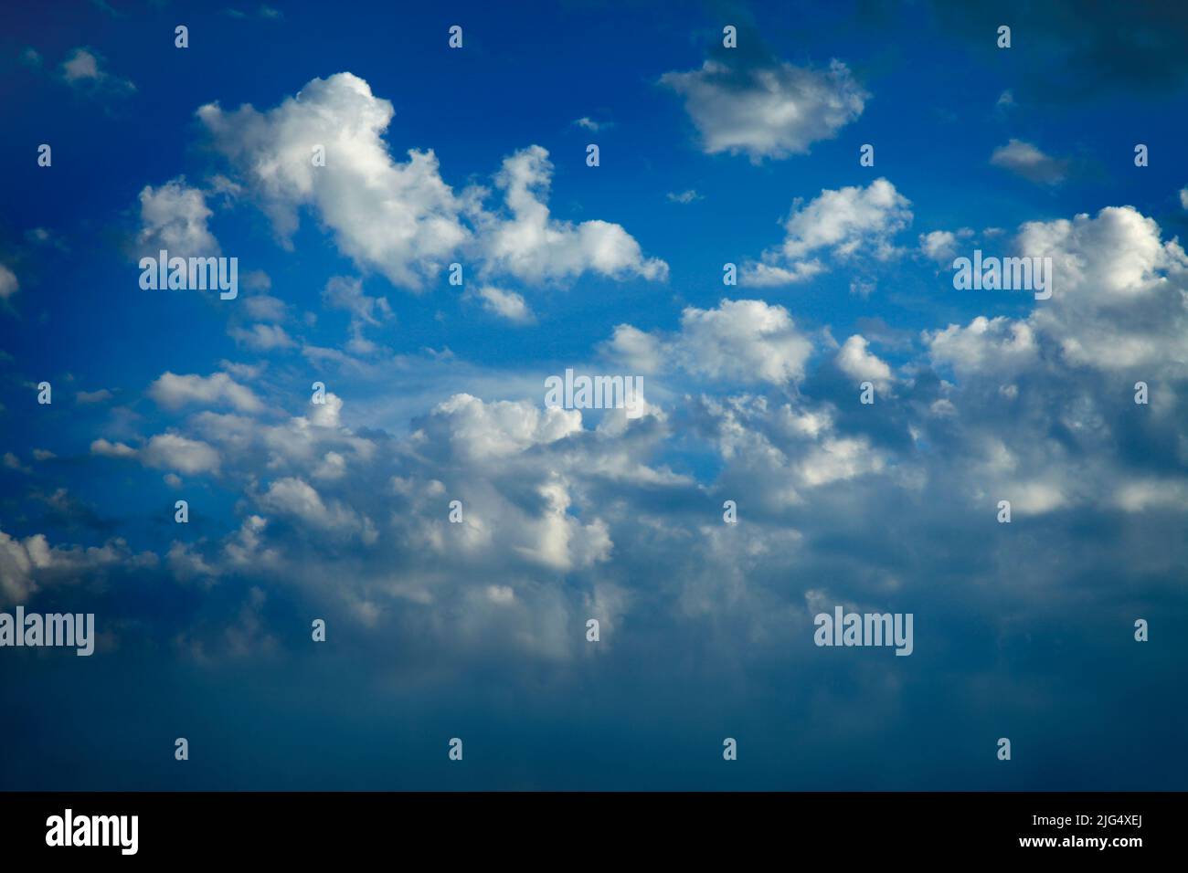 CLEAN AIR CONCEPT: Blue sky with fluffy clouds Stock Photo