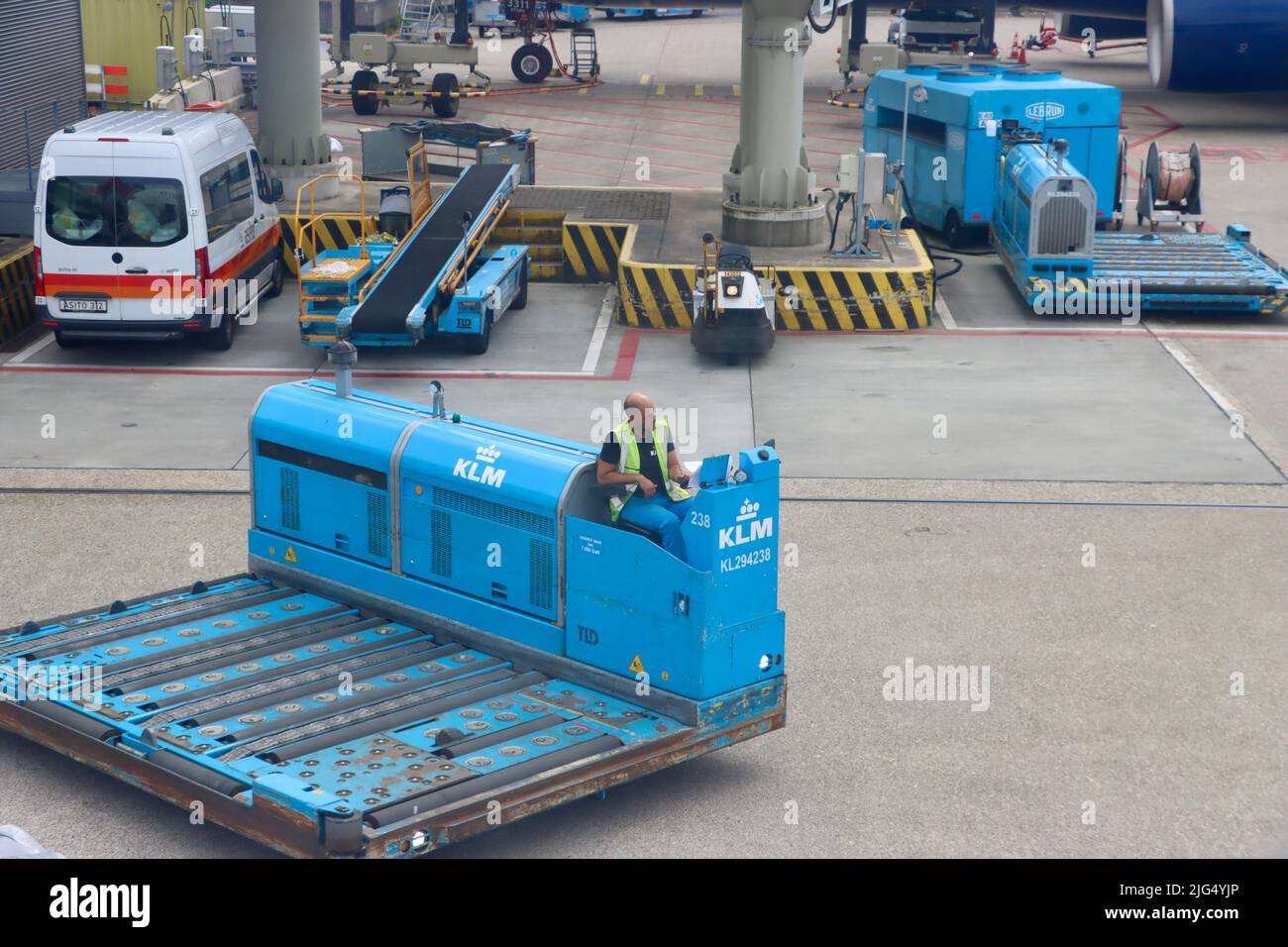 Cargo loader at Schiphol Amsterdam airport June 30th 2022 Stock Photo