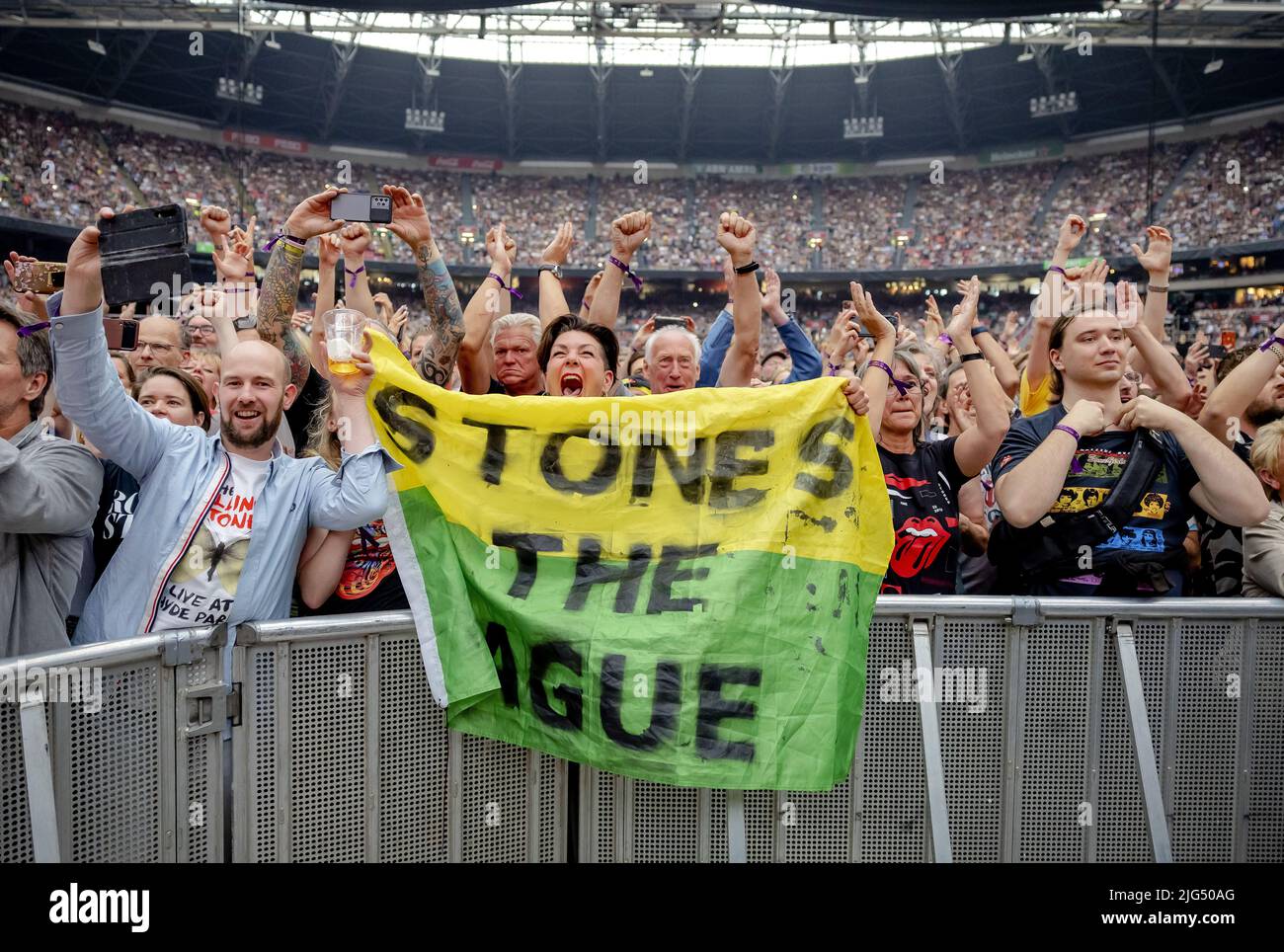 AMSTERDAM - 2022-07-07 20:48:25 AMSTERDAM - Audience during the concert of The Rolling Stones in the Johan Cruijff ArenA. With the SIXTY tour, Mick Jagger, Keith Richards and Ronnie Wood make their long-awaited return. ANP KIPPA ROBIN VAN LONKHUIJSEN netherlands out - belgium out Stock Photo