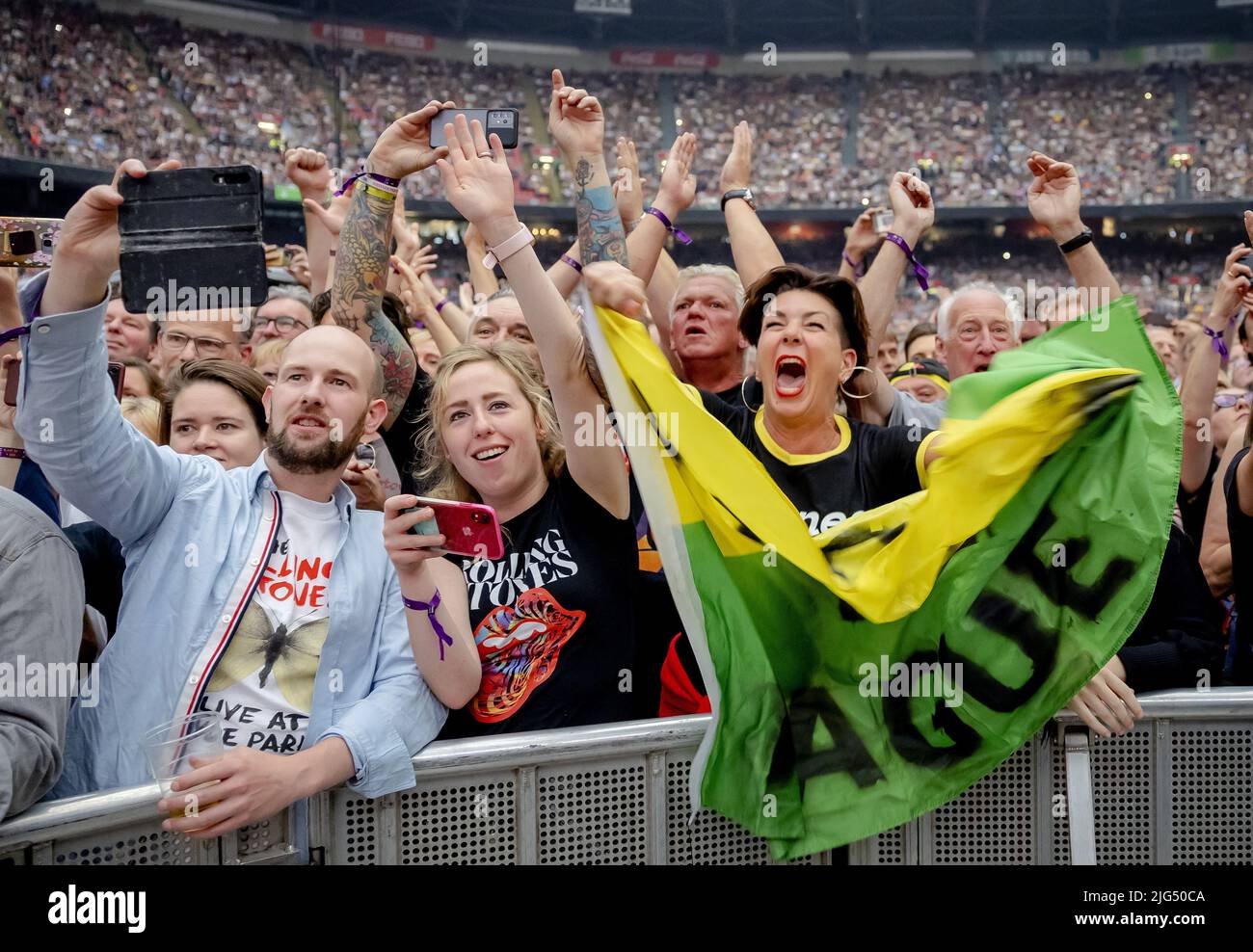 AMSTERDAM - 2022-07-07 20:48:23 AMSTERDAM - Audience during the concert of The Rolling Stones in the Johan Cruijff ArenA. With the SIXTY tour, Mick Jagger, Keith Richards and Ronnie Wood make their long-awaited return. ANP KIPPA ROBIN VAN LONKHUIJSEN netherlands out - belgium out Stock Photo