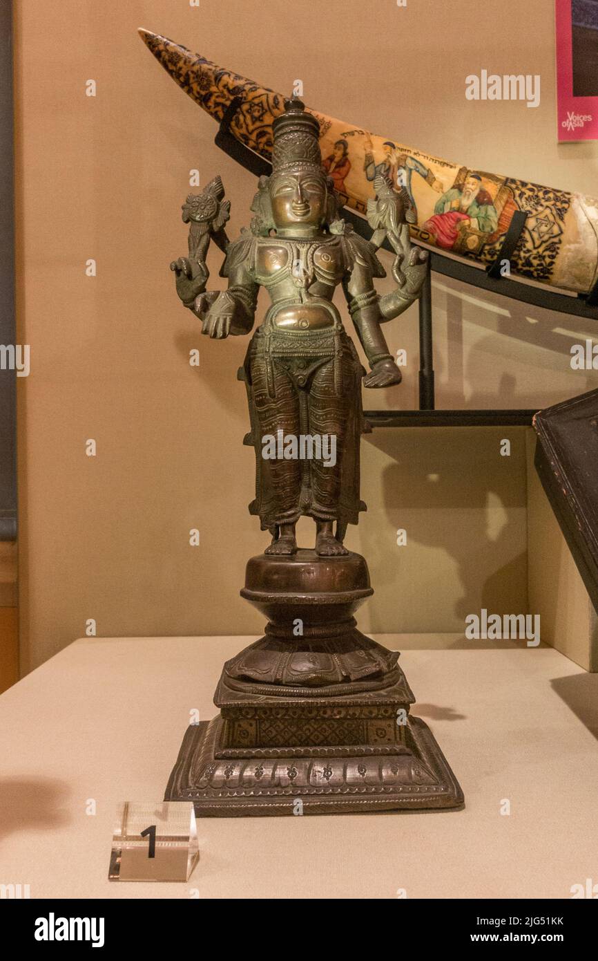 A Vishnu figure from South India (1870-1910) cast in bronze on display in the UK. Stock Photo