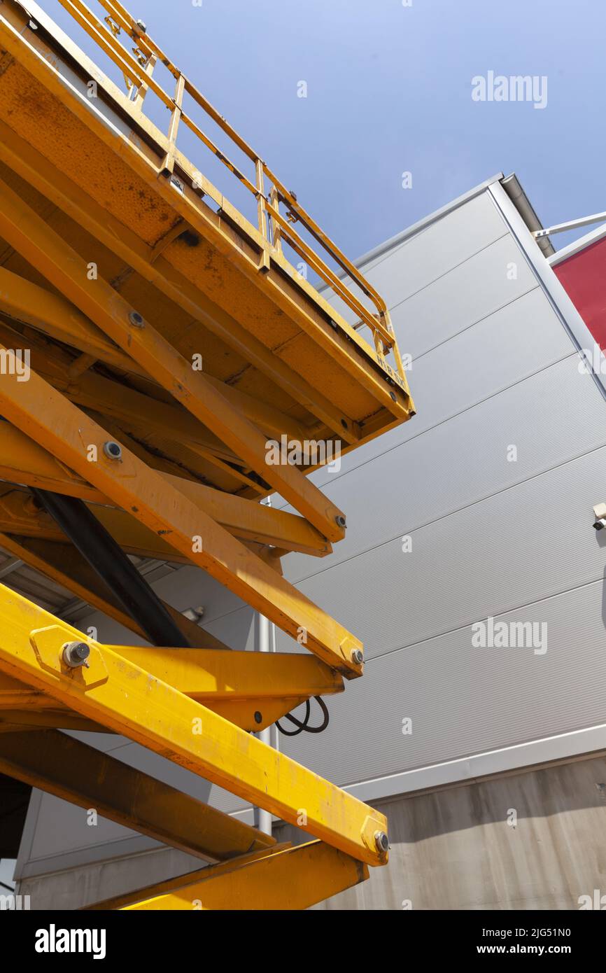 a platform for raising construction workers, close up bottom perspective Stock Photo
