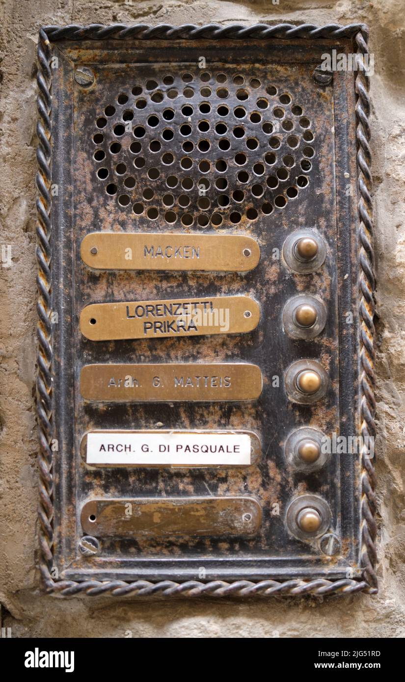 Door bells and name plates on residential building in Florence Italy Stock Photo