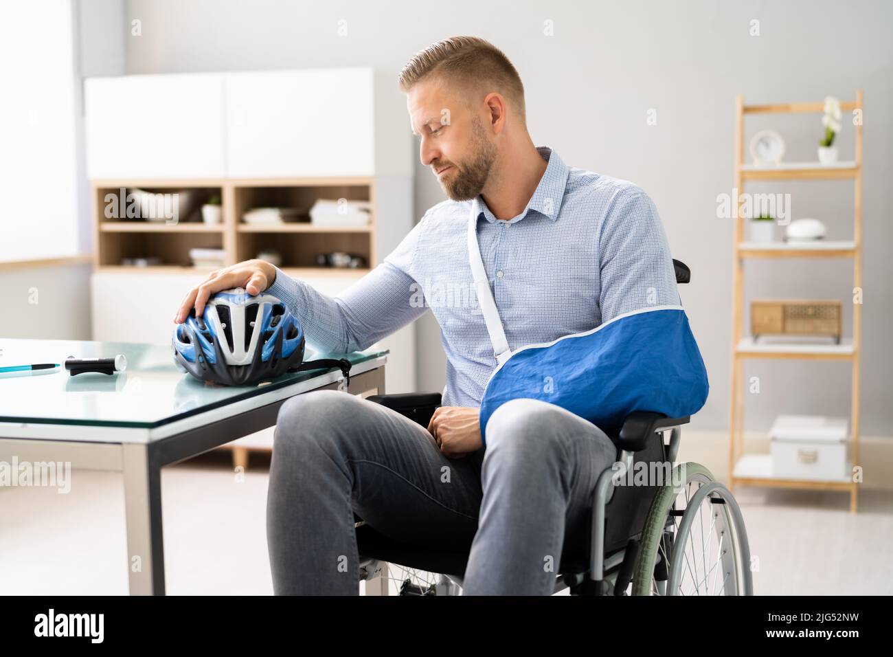 Motorcycle Accident Injury. Man With Arm Fracture. Hand Recovery Stock Photo