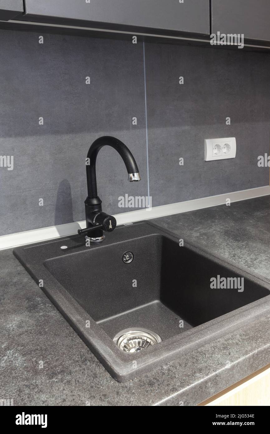 black sink in the kitchen, close up Stock Photo