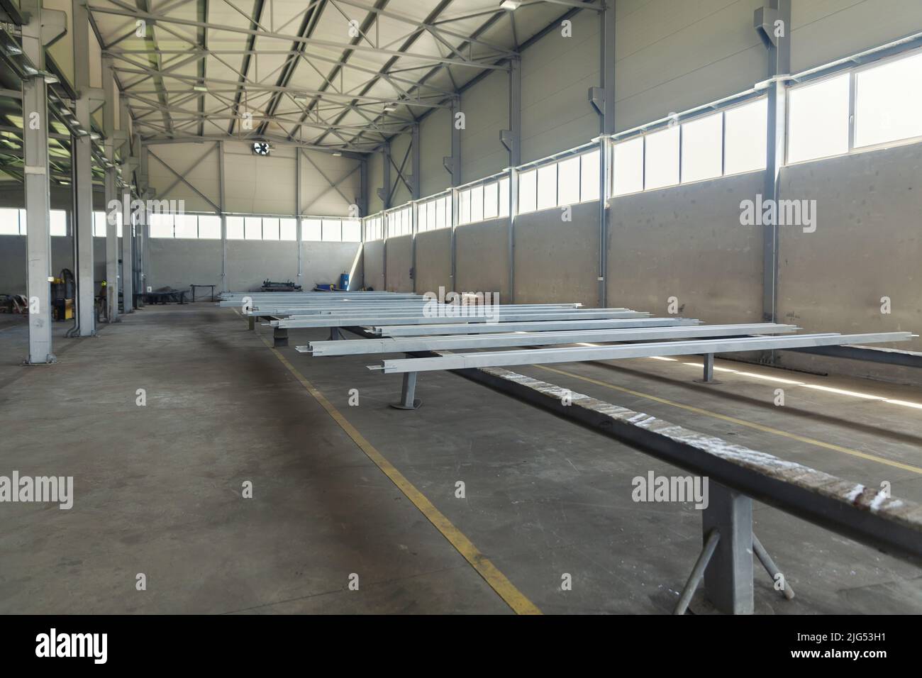steel construction of the hall roof with insulating panels Stock Photo