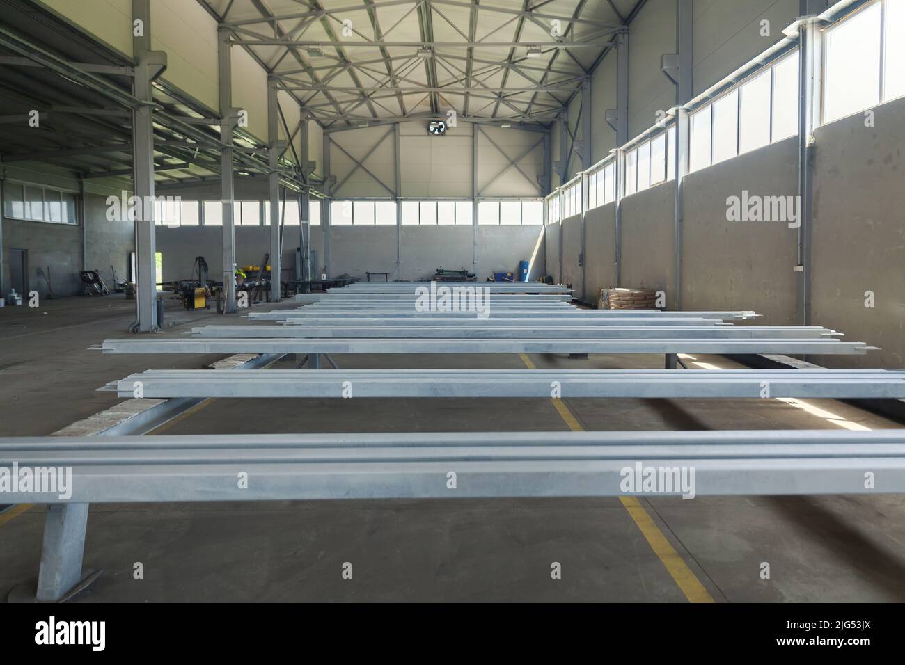 steel construction of the hall roof with insulating panels Stock Photo
