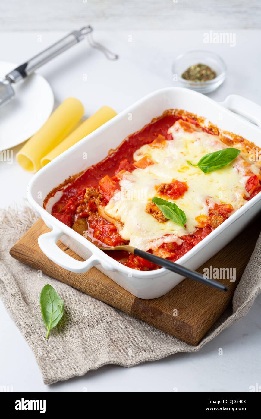 close up of baked pasta canelloni with beef cheese tomato food Stock Photo