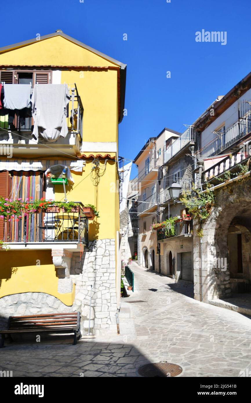 A narrow street between the old houses of Guardia Sanframondi, a