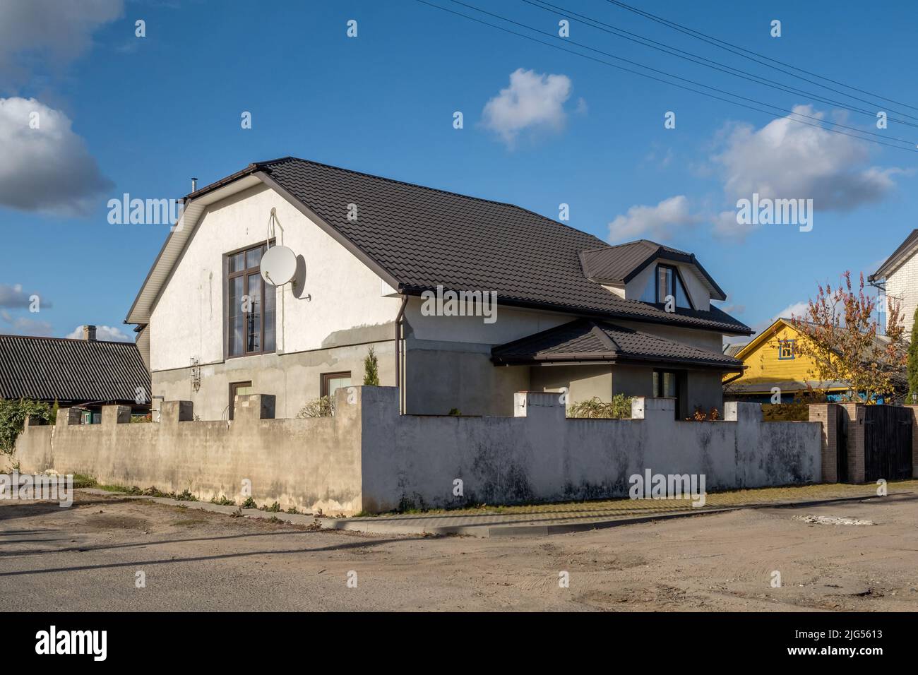 two-story concrete or brick country house Stock Photo