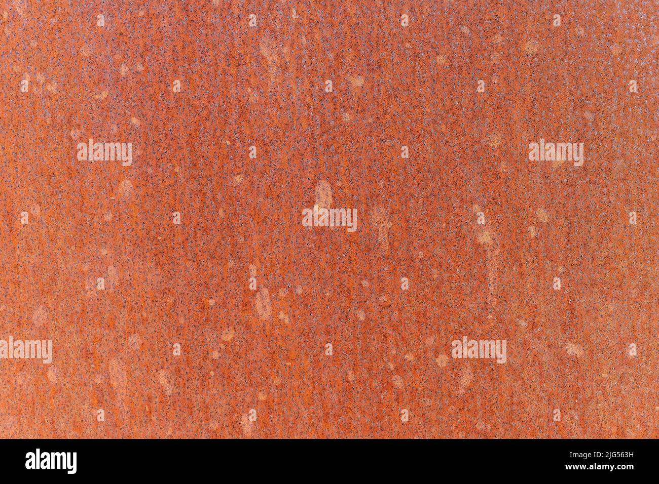 Background of rusty weathering corten steel. Stock Photo