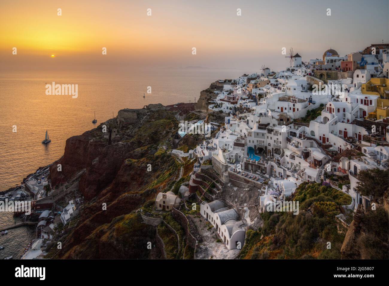 Amazing sunset at Oia, the most typical village of Santorini, Greece Stock Photo