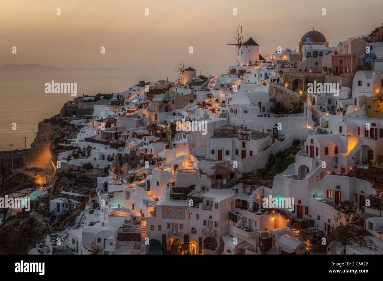 Amazing sunset at Oia, the most typical village of Santorini, Greece Stock Photo